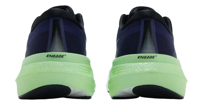 Pair of black and green running shoes with 'Engage' branding on a white background