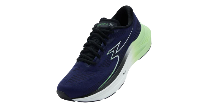 Navy running shoe with green sole on a white background