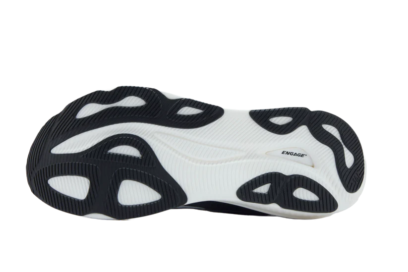 Black and white sneaker with unique sole design on a white background
