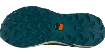 Teal shoe sole with textured pattern and brand logo on a white background