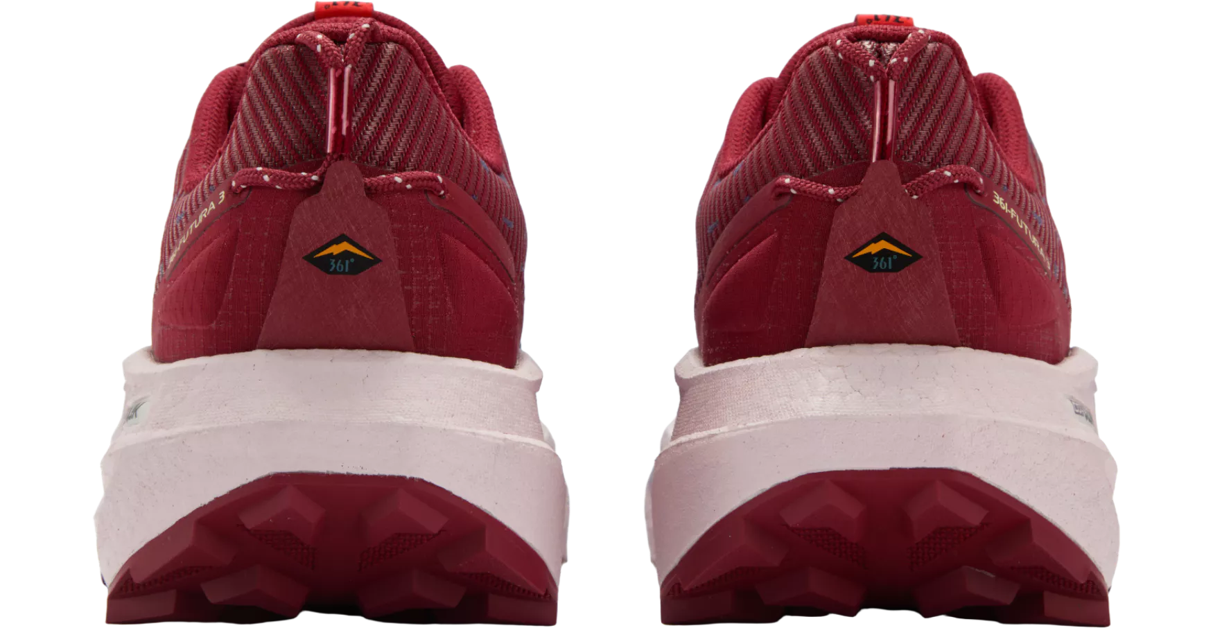 Red running shoes with white soles on a white background