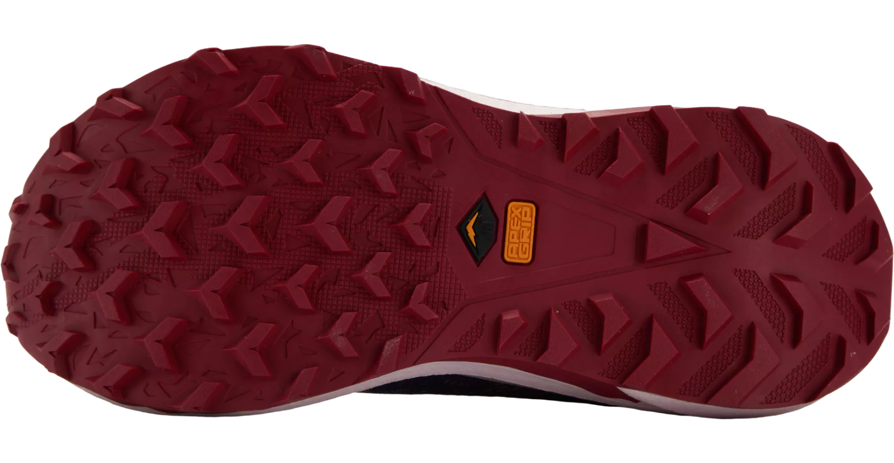 Close-up of a red hiking shoe sole with tread pattern on a white background