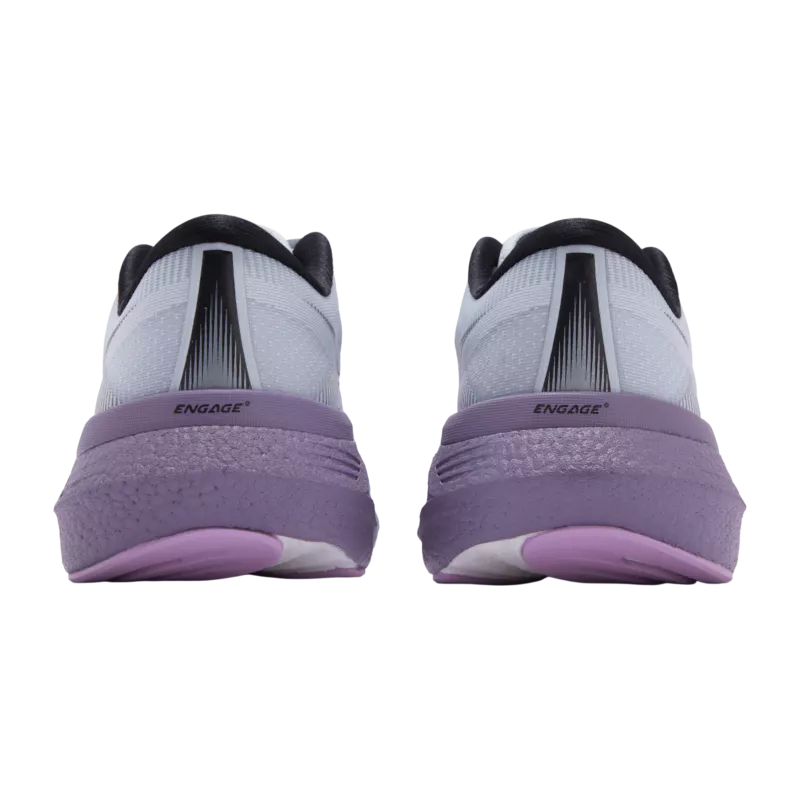 Pair of shoes with purple soles on a white background