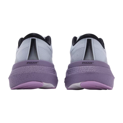 Pair of shoes with purple soles on a white background