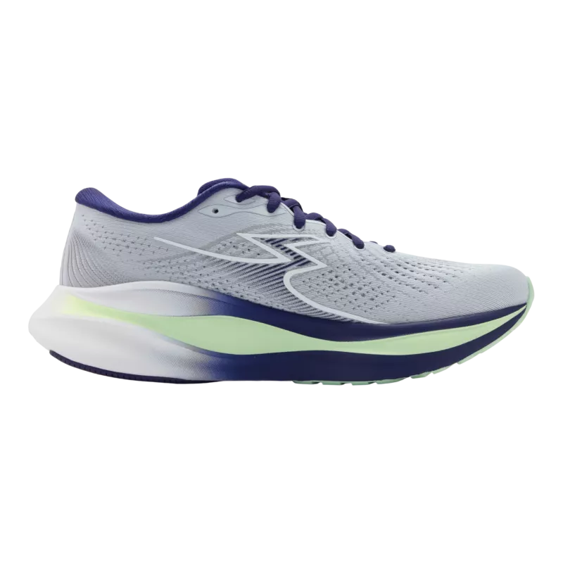 White running shoe with blue and green accents on a white background