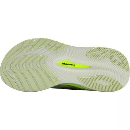 Light green athletic shoe sole with 'Extremis' branding on a white background