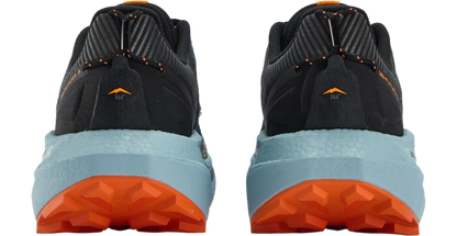 Rear view of a pair of trail running shoes showing the midsole and heel counter. The shoes feature a black and dark gray upper, a light blue midsole, and an orange outsole.