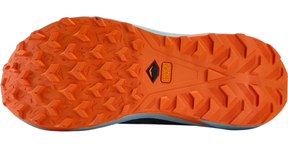 Close-up of the outsole of a trail running shoe, showing a bright orange tread pattern with a black and orange Vibram logo in the center, on a white background.