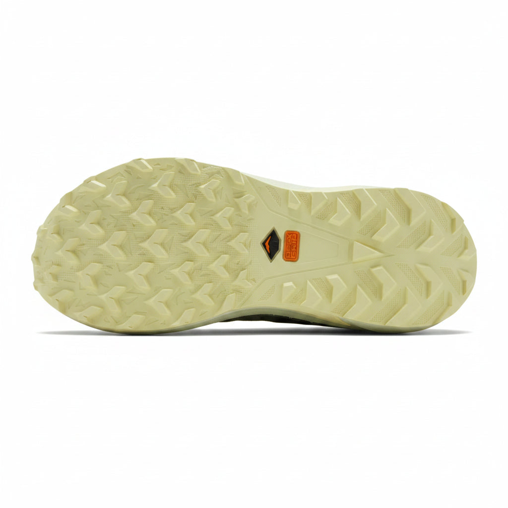 Close-up of a shoe sole with a brand logo on a white background