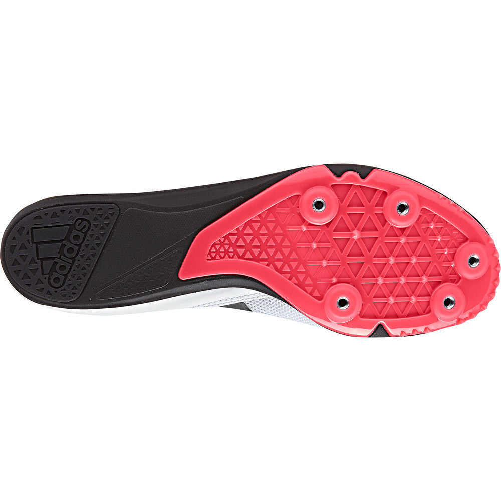 Close-up of a running shoe sole with red and black design on a white background