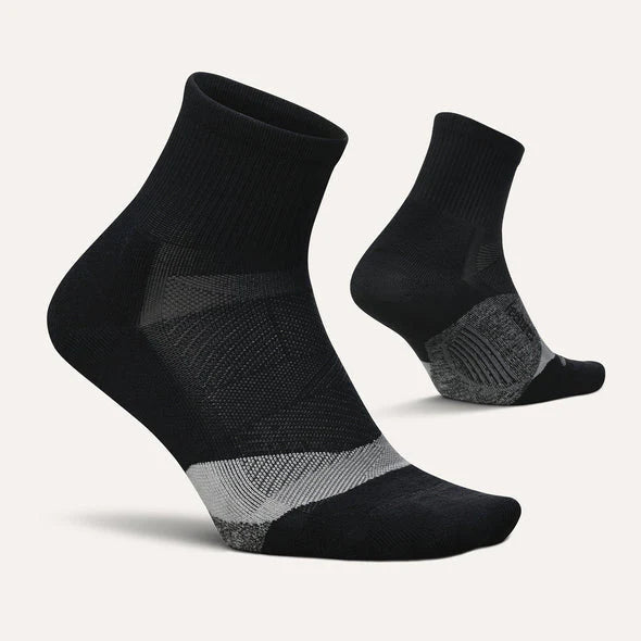 A pair of black Feetures Elite Light Cushion quarter socks designed for running, showing the side profile with the ankle and foot area focused.