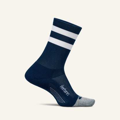 A pair of navy high-top stripe Feetures Elite Light Cushion Mini Crew socks designed for ultimate comfort and performance with targeted compression.