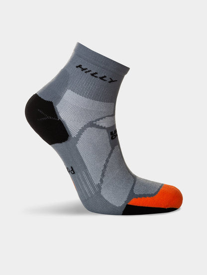 Gray sock with orange toe and black heel on a white background, featuring the Hilly brand.