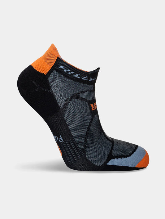 Black ankle sock with orange accents on a light gray background