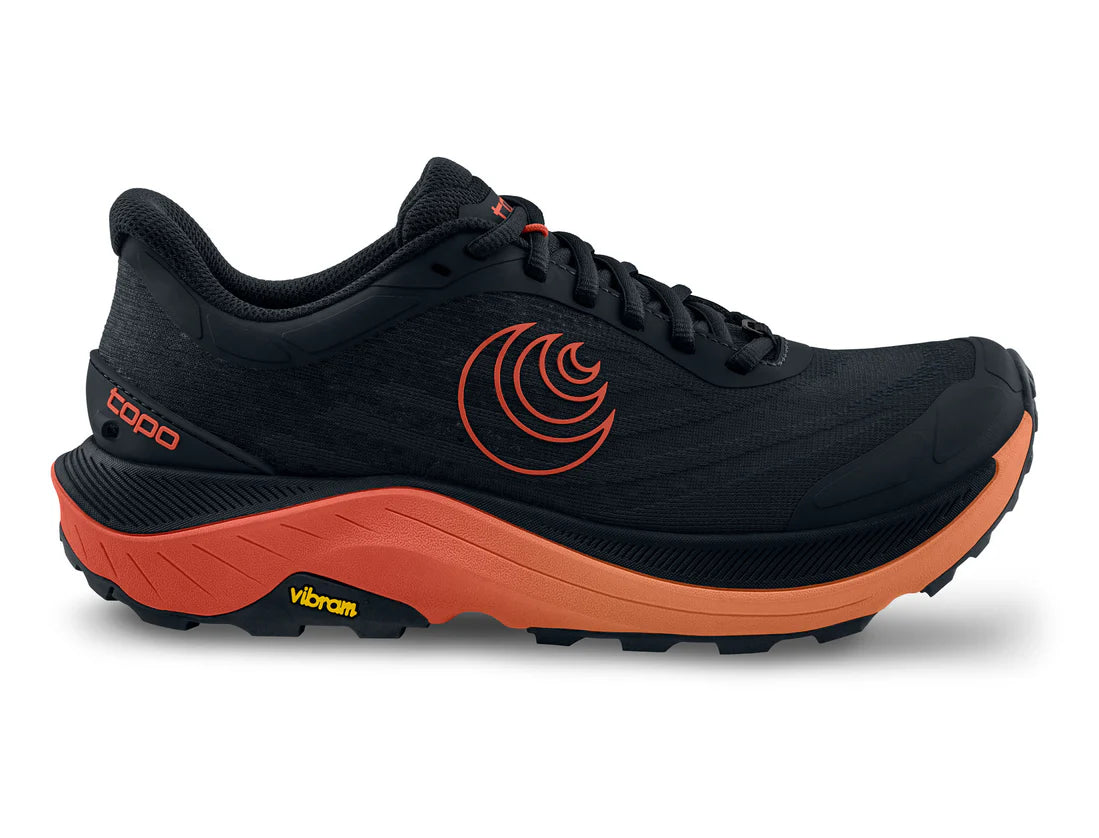 Black and orange running shoe with visible branding on a white background