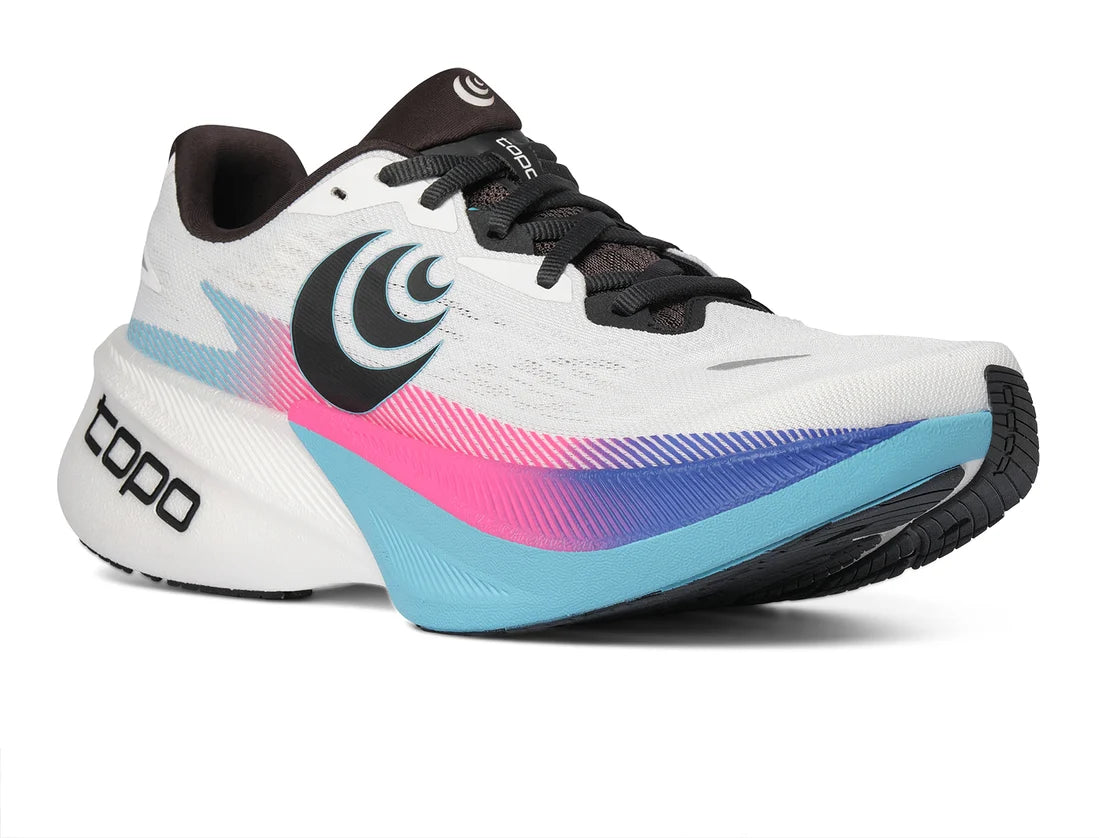White Topo Specter 3 running shoe with colourful sole and black top on a white background 