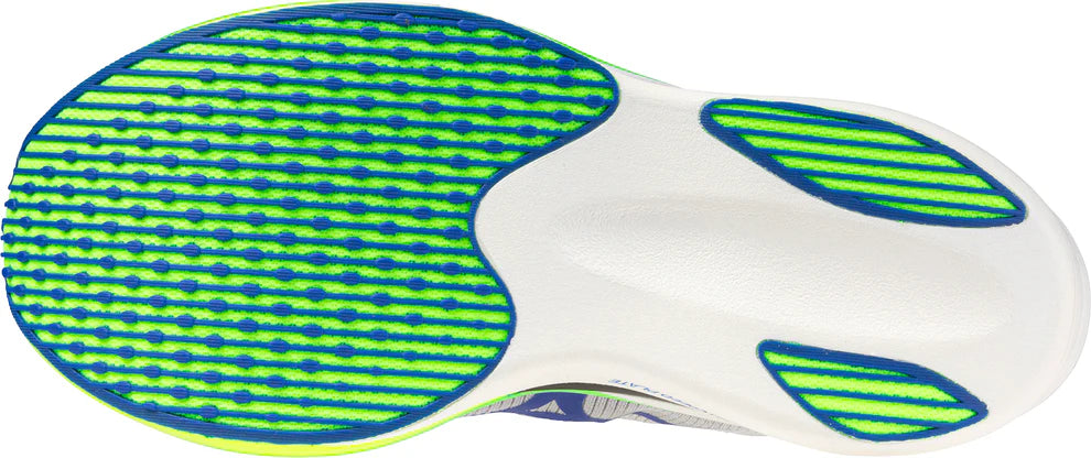 Close-up of a white athletic shoe sole with green and blue patterns