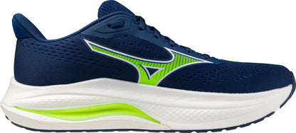 Navy and green running shoe with white sole on a white background