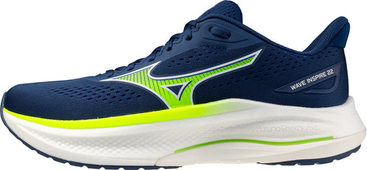 Blue running shoe with green accents on a white background