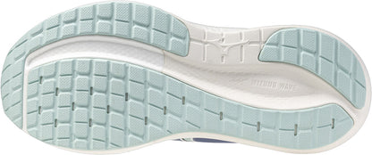 Close-up of a Mizuno Wave Inspire 22 women's running shoe sole with tread pattern and brand logo.