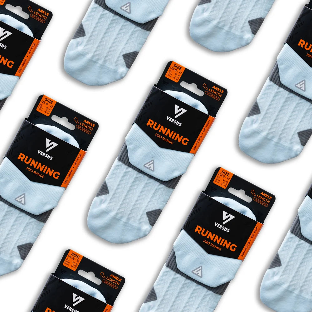 Versus running socks with packaging on a white background