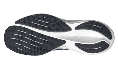 Close-up of a running shoe sole with 'Brooks' branding on a white background