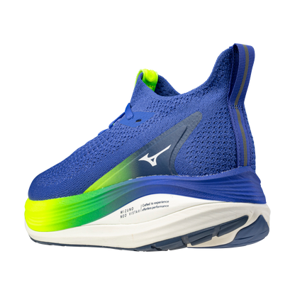 Blue running shoe with green sole on a white background