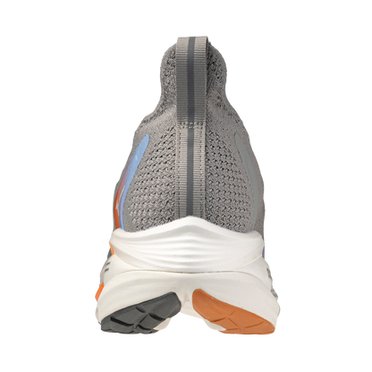Gray running shoe with a white sole on a white background