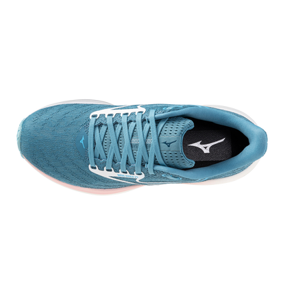 Blue running shoe with white laces on a white background