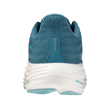 Blue running shoe with white sole on a white background