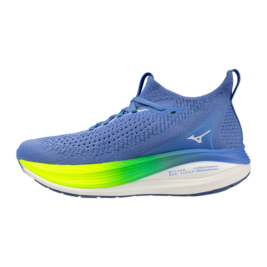 Blue running shoe with a bright green sole on a white background