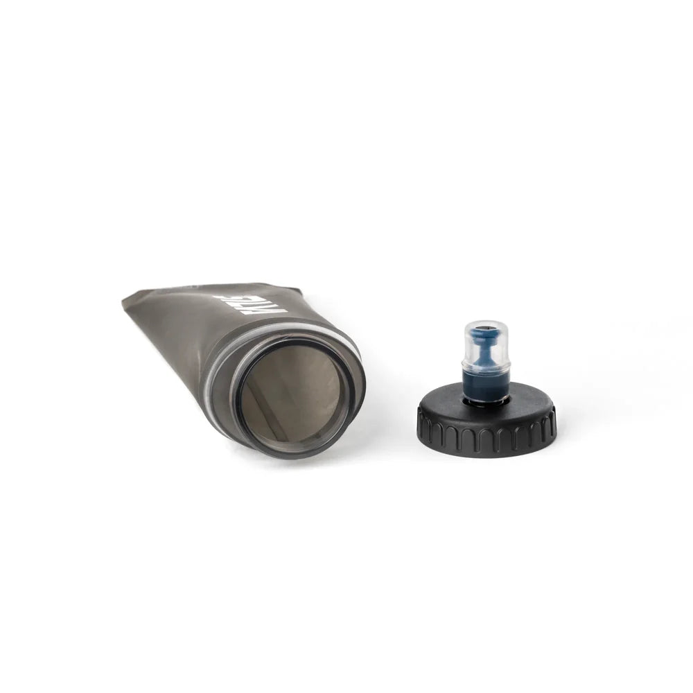 Soft flask with black cap on a white background