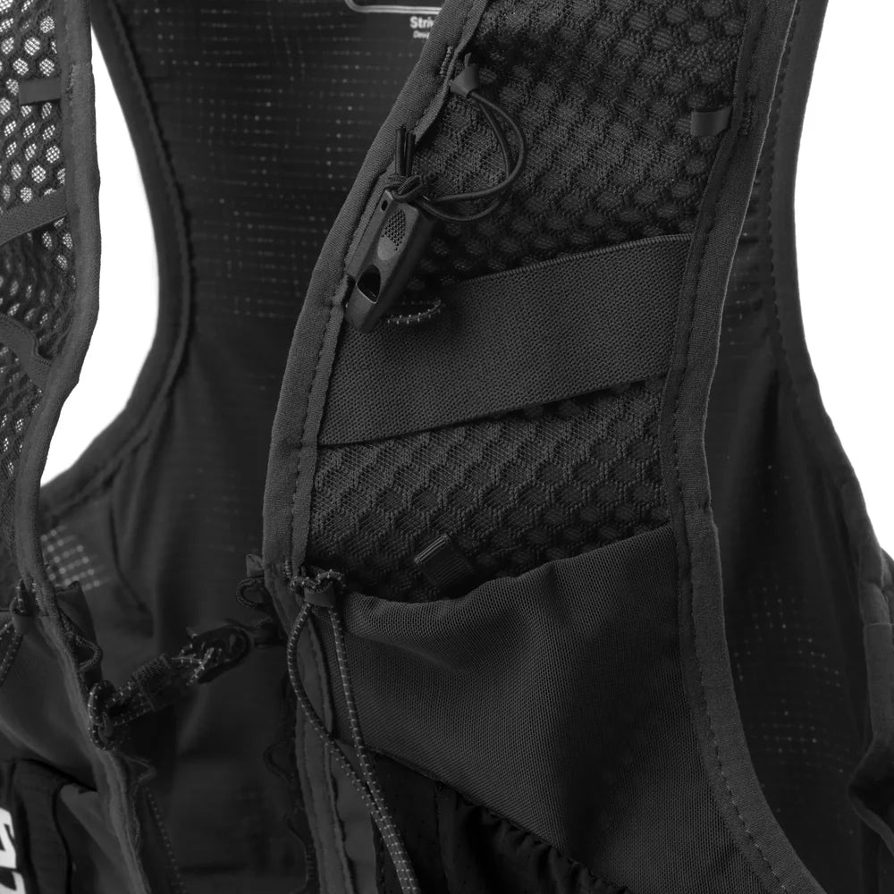 Close-up of a black running vest with mesh back and multiple pockets.