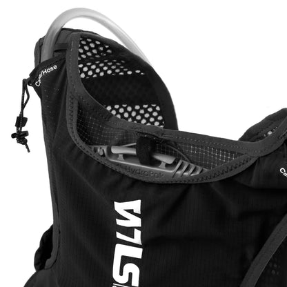Close-up of a black hydration backpack with a visible brand logo on a white background