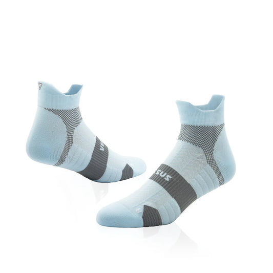 Pair of light blue and gray Versus Performance Ankle Running socks on a white background