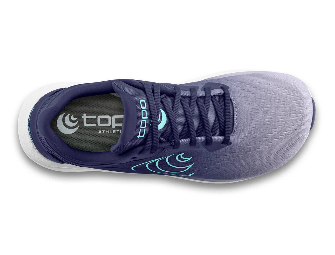 Purple athletic shoe with white sole on a white background