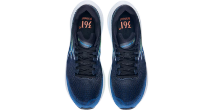 Blue running shoes with visible brand logo on a white background