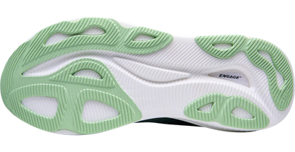 Close-up of a shoe sole with green and white design on a white background