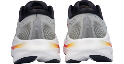 Gray running shoes with white soles on a white background
