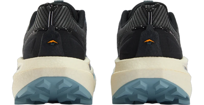 A pair of hiking shoes shown from the back, featuring a black and gray knit upper, a cream midsole, and a blue-gray lugged outsole.