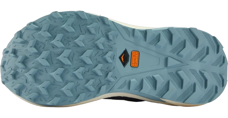 Close-up of the outsole of a trail running shoe in a dusty blue-gray color, showing the tread pattern and a small orange and black Apex Grip logo near the heel.