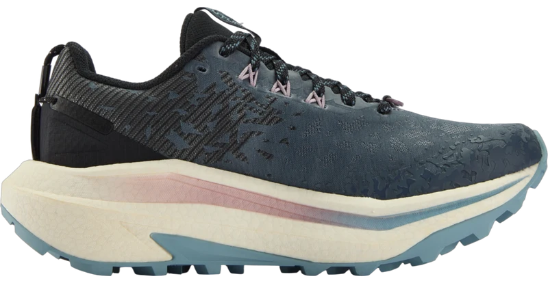A single trail running shoe shown in a side profile view against a white background. The upper is a textured dark slate blue, the midsole is cream with a pink accent stripe, and the outsole is light blue.