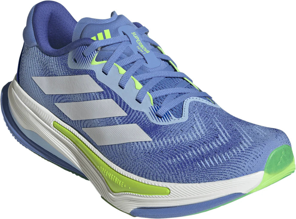 Blue running shoe with green accents on a white background