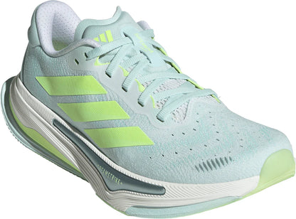 Light blue running shoe with green accents on a white background