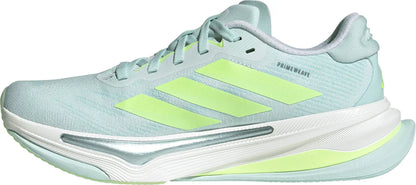 Adidas running shoe with green and white design on a white background