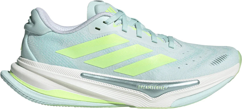 Light blue running shoe with green accents on a white background