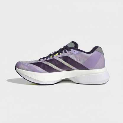 Purple Adidas sneaker on a light gray background