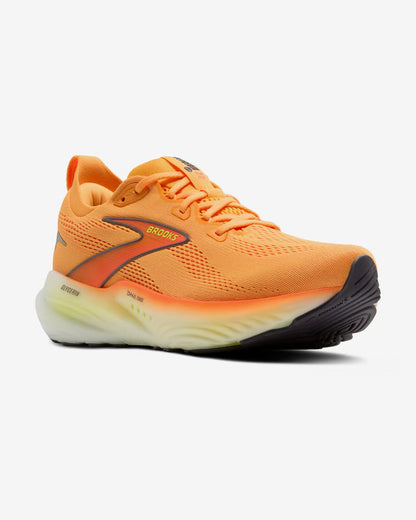 Orange running shoe with white sole on a light gray background