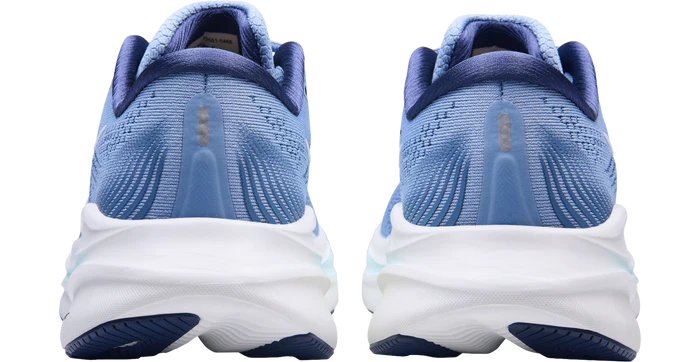 Blue running shoes with white soles on a white background