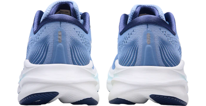 Blue running shoes with white soles on a white background